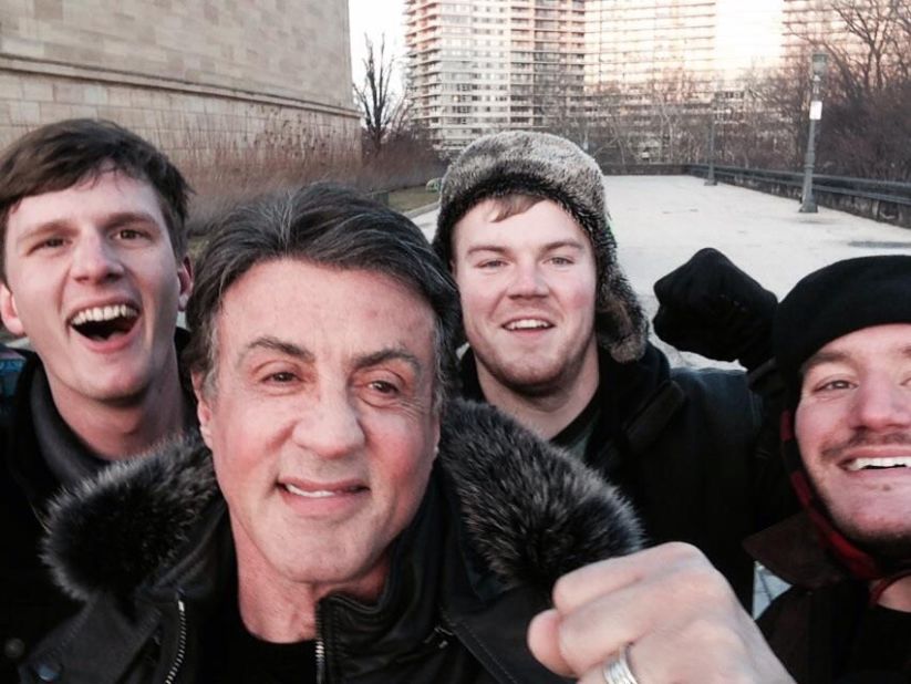 Peter Rowe, right, takes a selfie with friends Jacob Kerstan, left, Andrew Wright, third from left, and actor Sylvester Stallone in Philadelphia on Saturday, January 17. Rowe said the three friends had just finished racing up the steps at the city's Museum of Art, where Stallone filmed the classic training scene in "Rocky," and discovered the actor at the top of the steps.