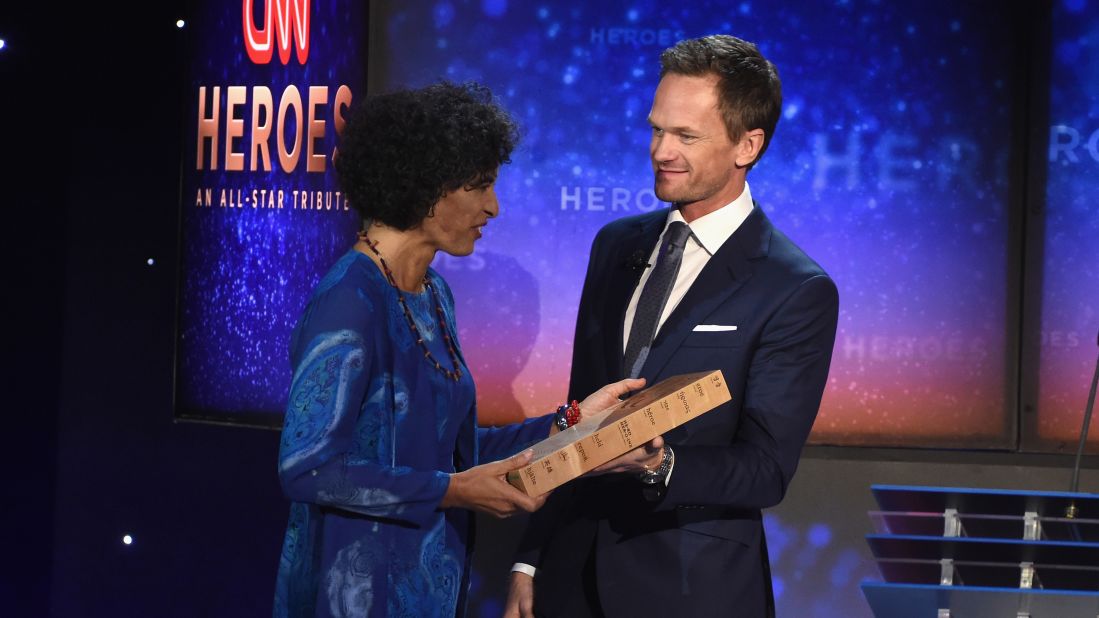 2015 CNN Top 10 Hero Monique Pool receives her award from presenter Neil Patrick Harris. Pool -- nicknamed "The Sloth Lady" -- was honored for her remarkable work with animals in Suriname.  
