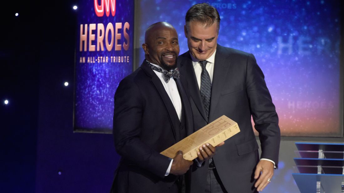The Rev. Richard Joyner receives his award from Chris Noth. Joyner -- a 2015 Top 10 CNN Hero -- was recognized for founding an ambitious garden project aimed at improving the health of residents in and around his North Carolina community. 