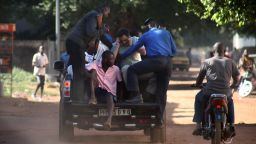 Malian security forces evacuate hostages freed from the Radisson Blu Hotel in Bamako on November 20.