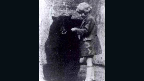 Author A.A. Milne's son, Christopher Robin, pictured here with the original black bear who inspired "Winnie-the-Pooh." 