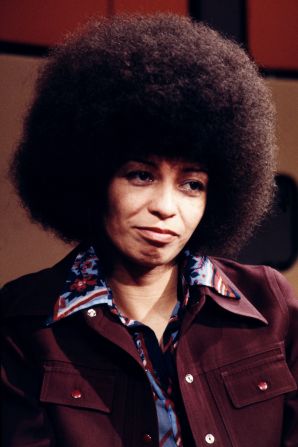 Walker notes that civil rights activist Angela Davis made a powerful statement with her Afro.