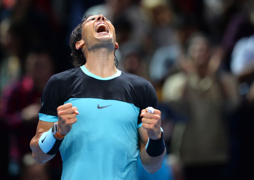 Rafael Nadal celebrates after he beat David Ferrer 6-7 (2-7) 6-3 6-4 at the World Tour Finals Friday. He ended the group stage 3-0. 