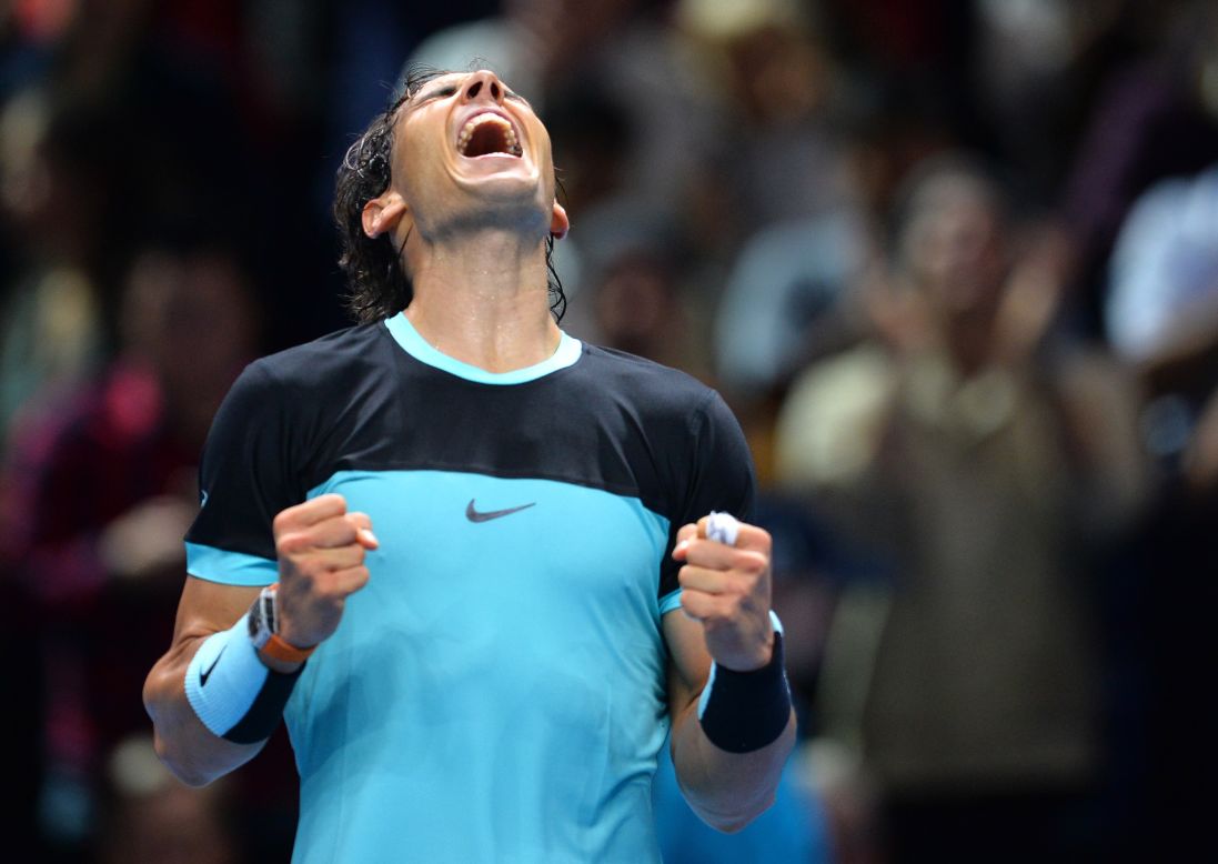 Rafael Nadal celebrates after he beat David Ferrer 6-7 (2-7) 6-3 6-4 at the World Tour Finals Friday. He ended the group stage 3-0. 