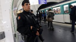 A French gendarme enforcing the Vigipirate plan, France's national security alert system, patrols on November 19, 2015 in a railway station Paris. France revealed on November 19 it will spend an extra 600 million euros (USD 641 million) next year to ramp up security after the Paris attacks. President Francois Hollande announced this week that France is freezing plans to cut troop numbers through 2019. At the same time, the country will add 8,500 law enforcement jobs including 5,000 new police. AFP PHOTO / THOMAS SAMSON        (Photo credit should read THOMAS SAMSON/AFP/Getty Images)