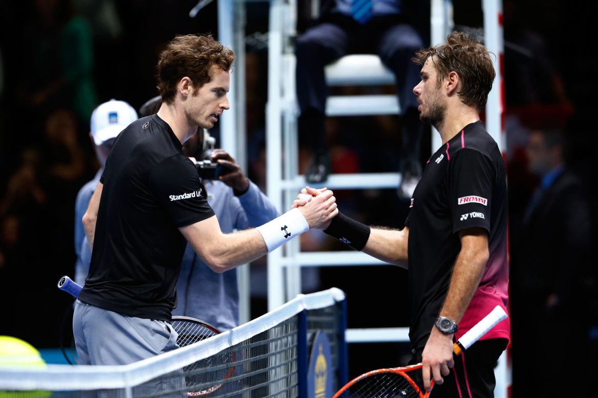 Stan Wawrinka, right, clinched second in the group after beating Andy Murray 7-6 (7-4) 6-4. Wawrinka now faces Roger Federer in a repeat of last year's semi won by Federer in three dramatic sets. 