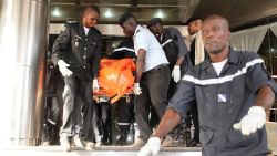 Officers evacuate bodies of victims from the Radisson Blu hotel in Bamako on November 20, 2015, after the assault of security forces. Malian forces backed by French troops stormed the Radisson Blu hotel in the capital Bamako after suspected Islamist gunmen seized guests and staff in a nine-hour hostage crisis that left at least 18 people dead. UN Secretary-General Ban Ki-moon condemned the "horrific terrorist attack" on November 20, and indicated the violence was aimed at destroying peace efforts in the country. AFP PHOTO / HABIBOU KOUYATE         (Photo credit should read HABIBOU KOUYATE/AFP/Getty Images)