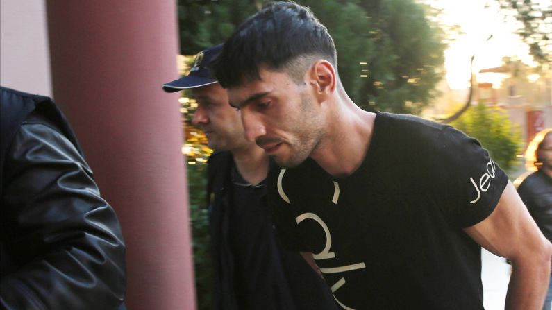 Belgian national Ahmad Dahmani, center, suspected to be involved in the November 13 Paris attacks, was arrested late Friday, November 20, in southern Antalya province, Turkey. Dahmani had been tracked by a police anti-terror unit after?he arrived at the Antalya International Airport -- on a flight from Paris -- the day after the massacre.