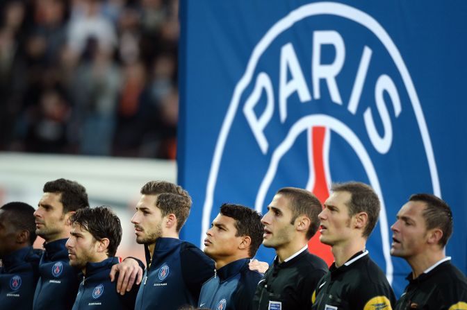 PSG players and referees sing the French national anthem La Marseillaise prior kick-off.