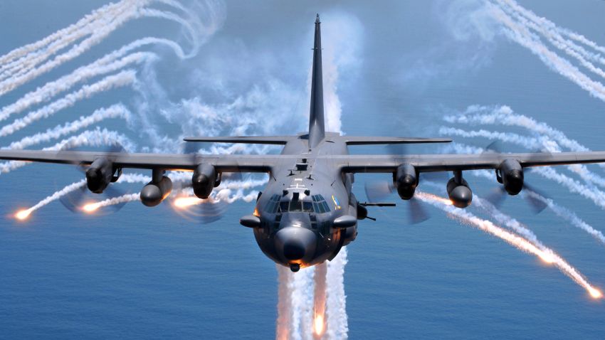 An AC-130H gunship from the 16th Special Operations Squadron, Hurlburt Field, Fla., jettisons flares as an infrared countermeasure during multi-gunship formation egress training on Aug. 24, 2007. (U.S. Air Force photo by Senior Airman Julianne Showalter) (RELEASED)