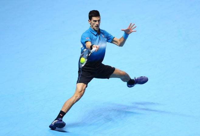 Djokovic pounds a forehand as he takes control against Federer in a largely one-sided final. 