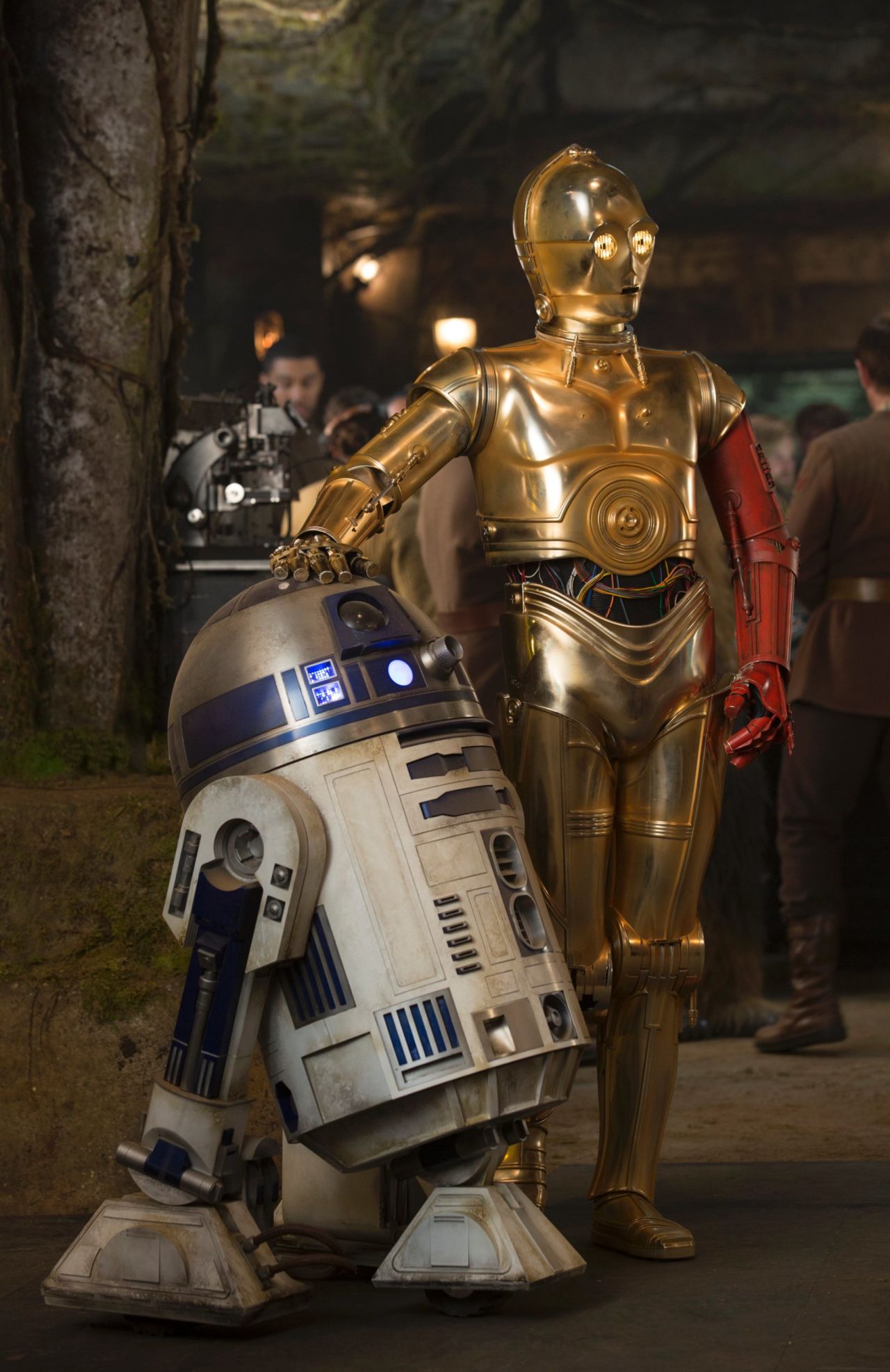 Poor old Threepio looks like a third-hand car with a door of a different color. Sloppy repair work or outlandish style choice? Whatever the case, J.J. Abrams has <a href="http://www.wired.com/2015/11/star-wars-force-awakens-jj-abrams-interview/" target="_blank" target="_blank">confirmed</a> that the red arm comes from the desire to "mark time," using a familiar character to signal the 30-year lapse since the end of "Return of the Jedi." We hear that the full story of C-3PO's limb replacement will be told in a <a href="http://www.starwars.com/news/star-wars-special-c-3po-1" target="_blank" target="_blank">comic book</a>.<br />