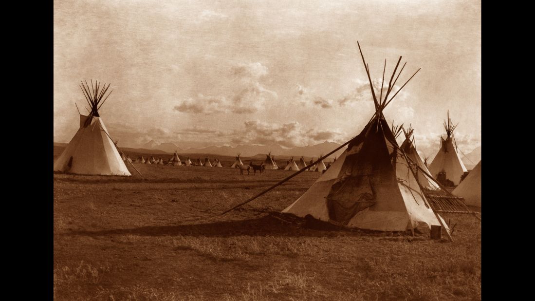 Teepees mark a Piegan encampment.