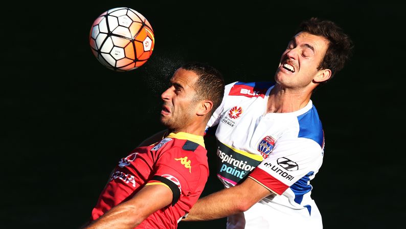 Adelaide United's Tarek Elrich, left, heads the ball as he is challenged by Ben Kantarovski of the Newcastle Jets during an A-League match in Adelaide, Australia, on Sunday, November 22.