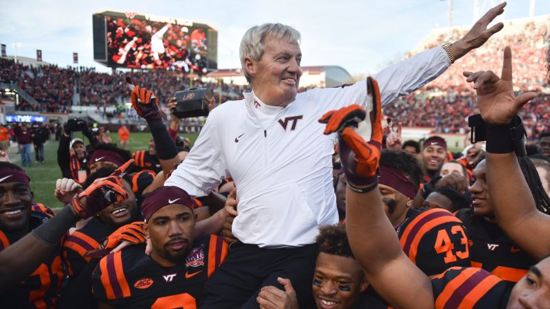 Virginia Tech football coach Frank Beamer is carried off the field after his last home game in Blacksburg, Virginia, on Saturday, November 21. Beamer, who has coached the Hokies for 29 years, is retiring at the end of this season.