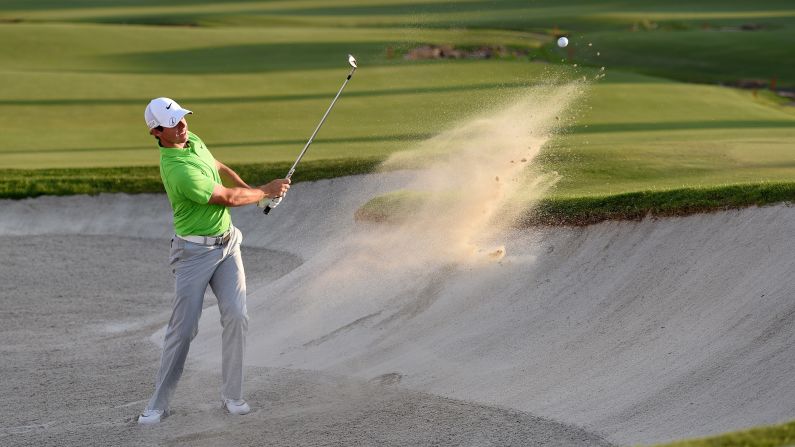 Rory McIlroy holes out from a bunker Thursday, November 19, during the first round of the DP World Tour Championship, a European Tour event in Dubai, United Arab Emirates. McIlroy would go on to win the tournament.