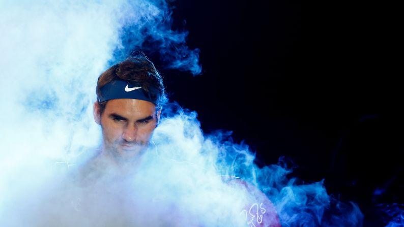 Roger Federer walks to the court before playing Novak Djokovic in the final of the ATP World Tour Finals on Tuesday, November 17.
