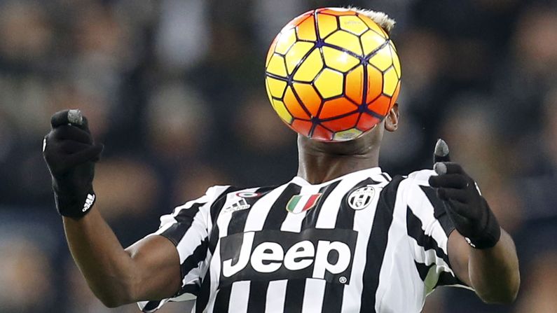The face of Juventus star Paul Pogba is obscured by the ball in this photo taken Saturday, November 21, in Turin, Italy.