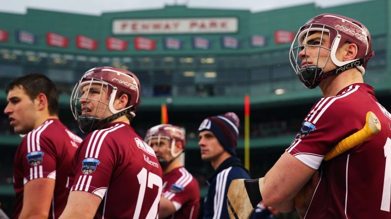 Players from the Irish hurling club Galway watch from the sideline as they play Dublin at Boston's Fenway Park on Sunday, November 22.
