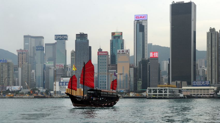 This photo taken on March 13, 2014 shows the Aqua Luna, one of Hong Kongs last remaining traditional Chinese junks, sailing past Hong Kong's skyline.  Hong Kong's economy is expected to expand at its fastest pace in three years in 2014, the government said on February 26, while slashing public welfare spending as it cautioned over global economic headwinds and projected a narrowing budget surplus.    AFP PHOTO / Laurent FIEVET        (Photo credit should read LAURENT FIEVET/AFP/Getty Images)