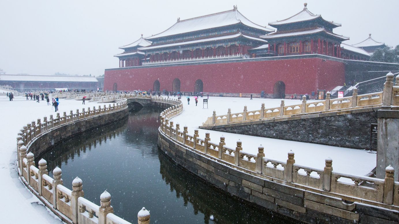Snow covers the Forbidden City in Beijing.