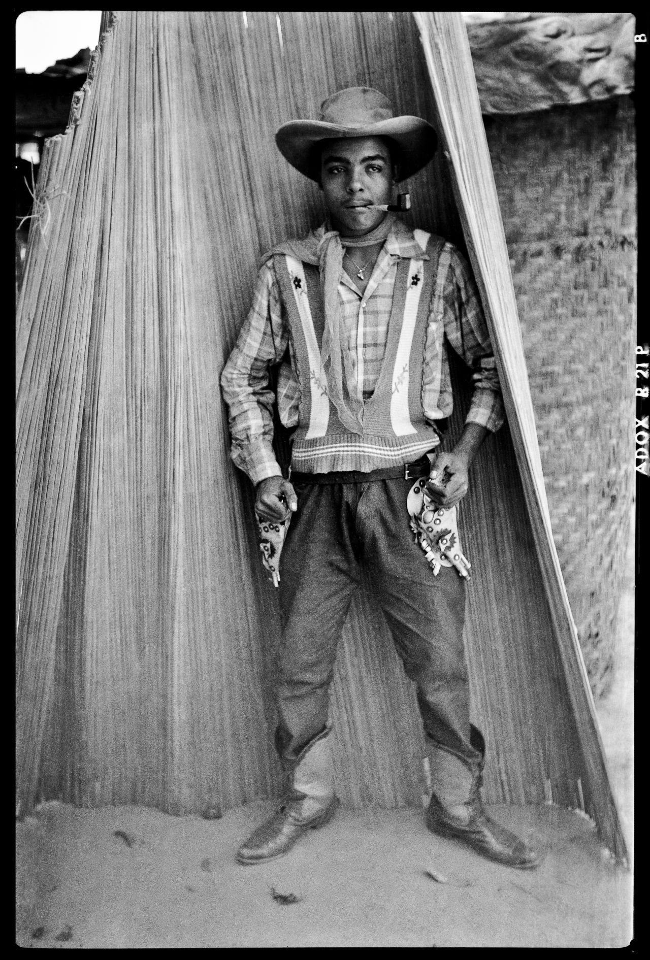 Bill and photographer Jean Depara made Kinshasa his canvas in the 1950s, capturing cowboys like Andrada in the urban neighborhoods they staunchly defended. Depara was an erstwhile shoemaker until 1953, first taking up the camera at his wedding in 1950, when he bought a small  Adox camera to record the occasion. His lens would go on to detail myriad examples of pop culture in the bubbling metropolis, but his series on the Bills is among his most famous.
