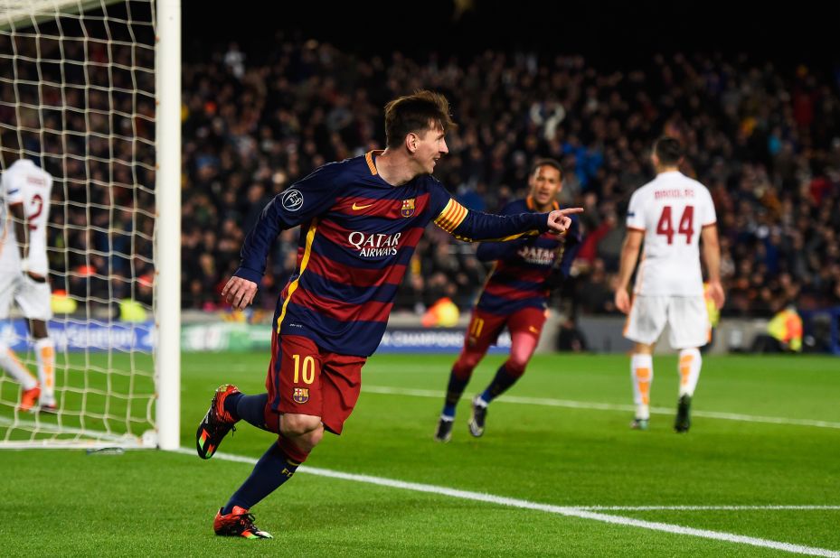 The returning Lionel Messi of Barcelona celebrates scoring his team's second goal against Roma in the 6-1 rout.