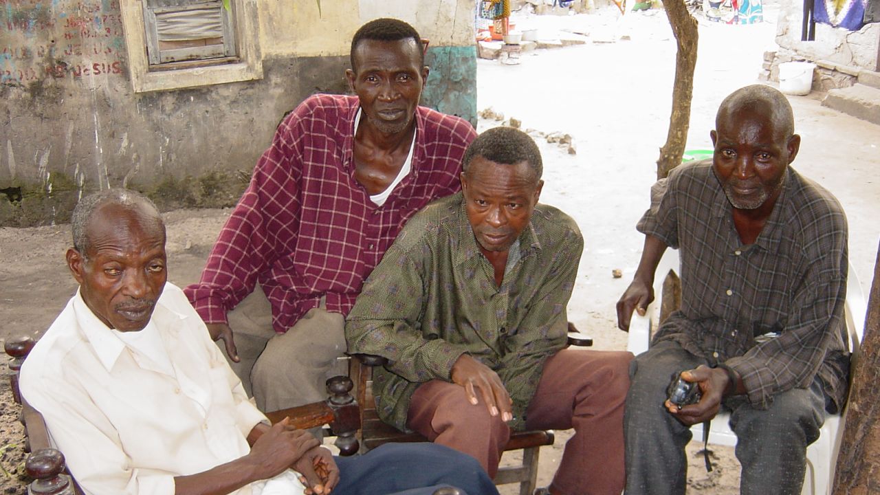 Former Bills of Quartier Mofewana in Ngiri Ngiri, including Vieux Neron (far left), Mofewana's legendary sheriff and the author of "Zambele Kingo," the Bills' anthem.