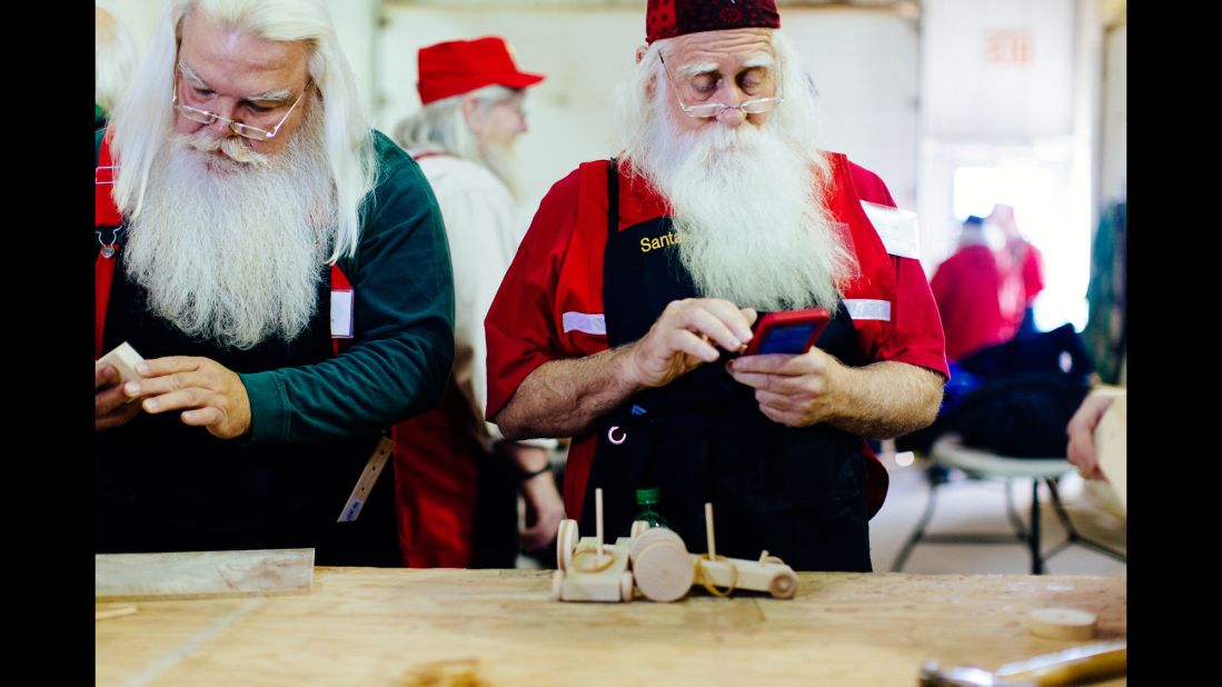 The Santas also learn how to make wooden toys at Valent's company, Gerace Construction. Children are going to ask how the toys are made, he says, so it's important for the Santas to have these experiences to draw from when they answer. 