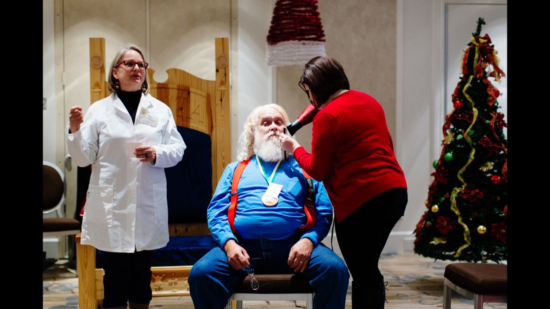 Sue Matthews Myers, who calls herself "Santa's personal hairdresser," offers advice on curling a mustache to make it look like it has been windblown by the sleigh ride in. 