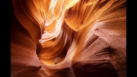 <strong>May 26:</strong> Sandstone sculpted by water and wind erosion is seen in a slot canyon, one of hundreds that surround Lake Powell near Page, Arizona.