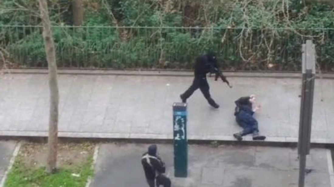 <strong>January 7:</strong> A masked gunman runs toward a victim during <a href="http://www.cnn.com/2015/01/07/world/gallery/paris-charlie-hebdo-shooting/index.html" target="_blank">a terrorist attack at the Paris office of Charlie Hebdo,</a> a French satirical magazine. From January 7 to January 9, a total of <a href="http://www.cnn.com/2015/01/10/world/france-paris-who-were-terror-victims/" target="_blank">17 people were killed</a> in attacks on Charlie Hebdo, a kosher grocery store, and the Paris suburb of Montrouge. Three suspects were killed by police in separate standoffs. Al Qaeda in the Arabian Peninsula claimed responsibility for the attacks.