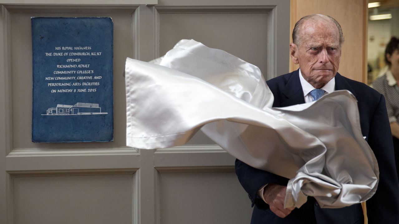 <strong>June 8:</strong> Britain's Prince Philip unveils a plaque at the end of his visit to Richmond Adult Community College, a school in southwest London that was opening its new art, drama and dance facilities.