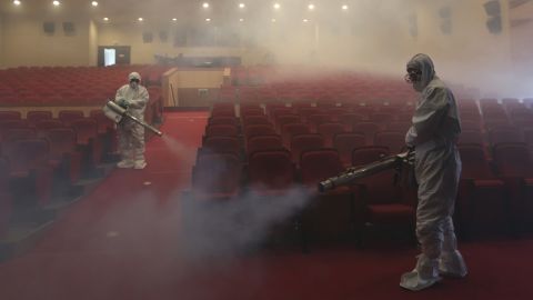 <strong>June 12:</strong> As a precaution against the spread of the MERS virus, workers spray antiseptic solution at an art hall in Seoul, South Korea. A few dozen people were killed <a href="http://www.cnn.com/2015/06/08/world/gallery/south-korea-mers/index.html" target="_blank">in an outbreak</a> that started in May.