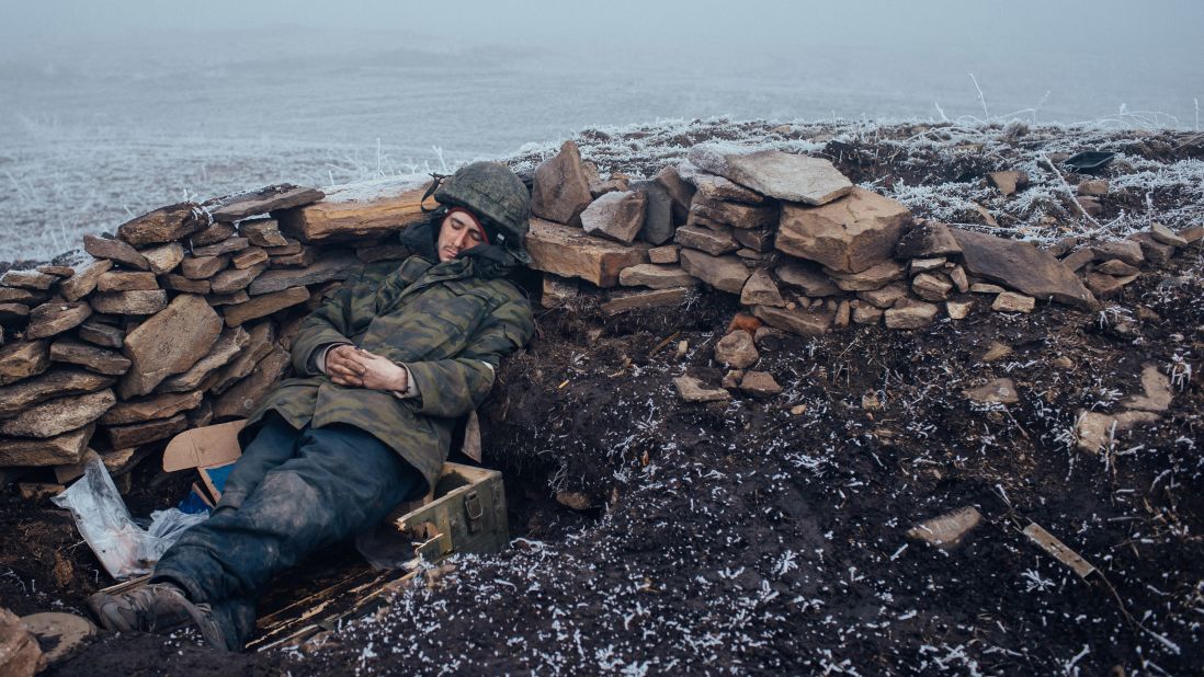 <strong>February 15:</strong> A pro-Russian rebel rests in Debaltseve, Ukraine, one day after a skirmish with Ukrainian troops. <a href="http://www.cnn.com/2015/03/02/europe/ukraine-death-toll/" target="_blank">Fighting between Ukrainian troops and pro-Russian rebels</a> has left more than 6,000 people dead since April 2014, according to the United Nations. A recent ceasefire, the so-called Minsk Agreement, has been repeatedly violated.