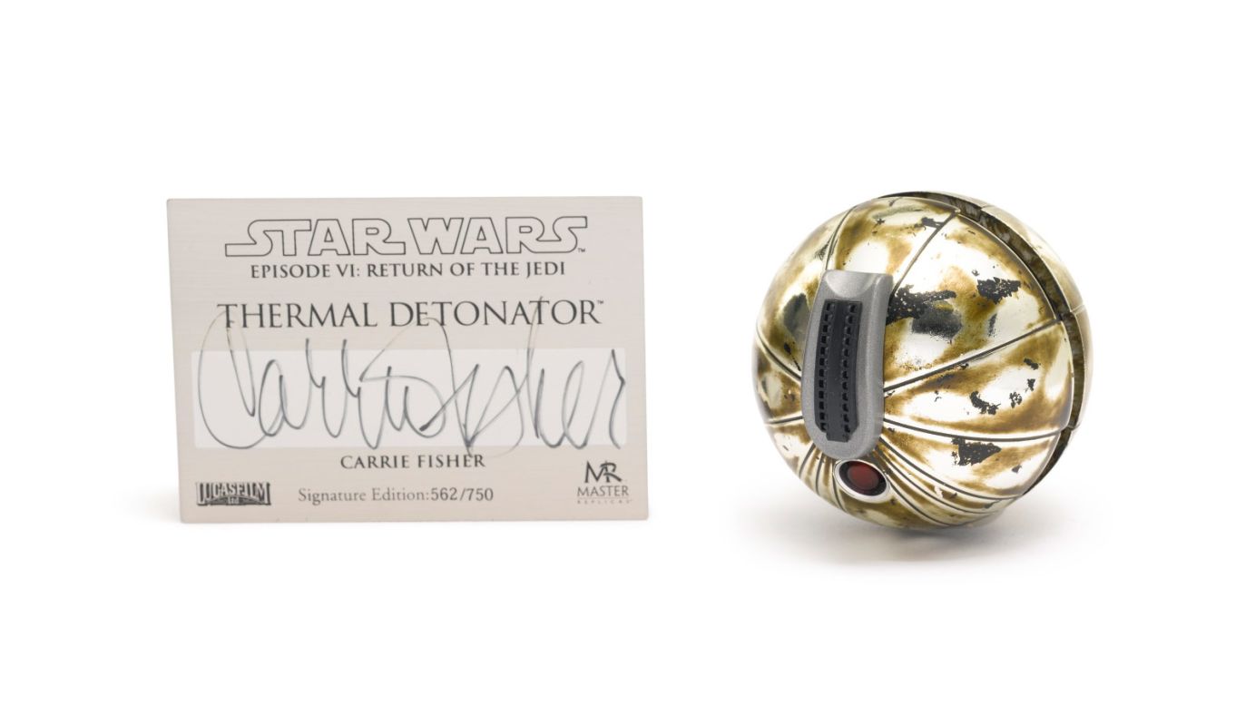 Princess Leia doesn't mess about, and when she took out a thermal detonator in Jabba's layer you knew she meant business. This replica, signed by Fischer, went for well above its prediction.