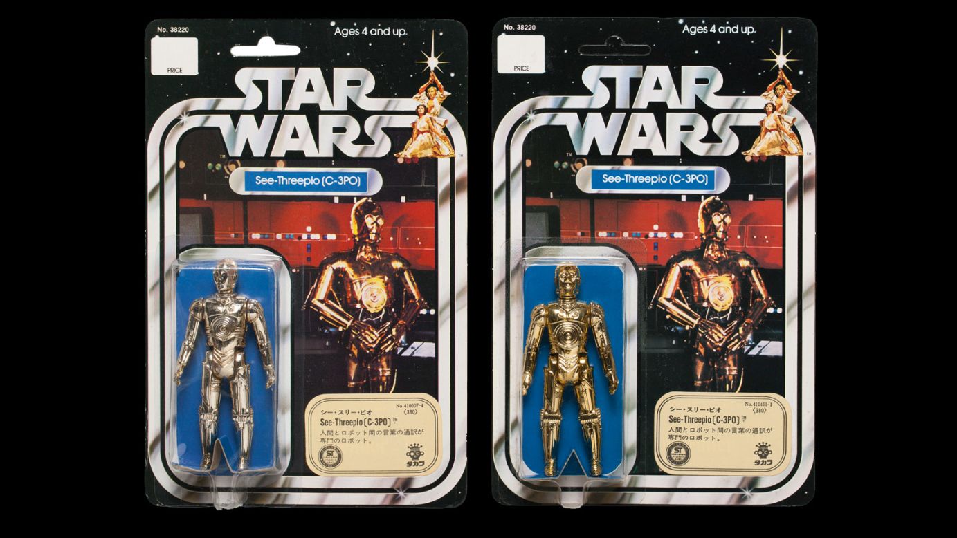 Made for the Japanese market, these Takara C-3PO figures from 1978 some with the full phonetic spelling on the backing card. In a field in which defects are welcomed for their rarity, the off-color C-3PO on the left probably increased this lot's value.