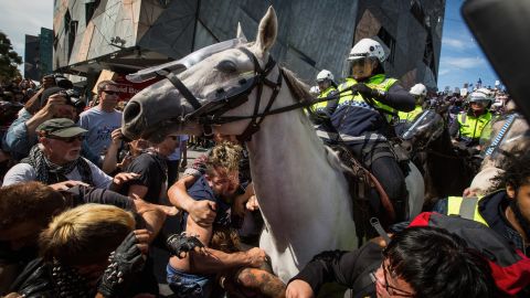 <strong>April 4:</strong> Police in Melbourne try to break up a fight between two sets of protesters. "Rally against racism" protesters were clashing with "Reclaim Australia" protesters. The "Reclaim Australia" protesters were rallying against what they called the "Islamization" of the country. 