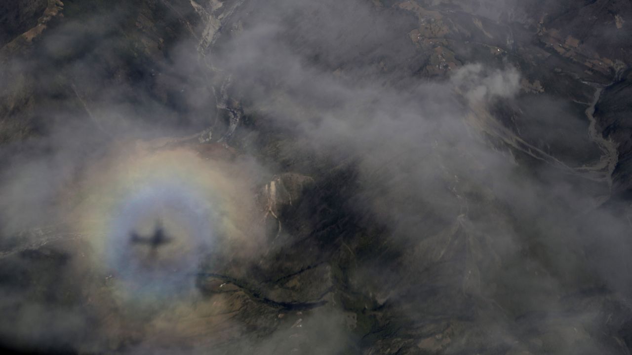 <strong>April 27:</strong> The shadow of an Indian Air Force plane is cast on clouds as it carries relief material in Kathmandu, Nepal. <a href="http://www.cnn.com/2015/04/25/world/gallery/nepal-earthquake/index.html" target="_blank">A magnitude-7.8 earthquake</a> rocked Nepal two days earlier, killing and injuring thousands.