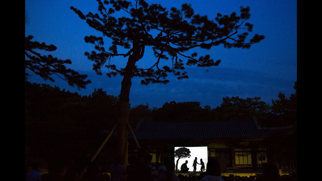 <strong>May 6:</strong> People watch a shadow play performance at Changgyeonggung Palace in Seoul, South Korea.