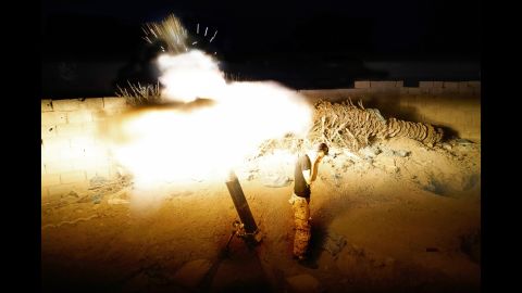 <strong>May 10:</strong> A member of the Iraqi Army fires mortars on ISIS positions in Ramadi, Iraq, days before the city <a href="http://www.cnn.com/2015/05/17/asia/isis-ramadi/" target="_blank">fell to the militant group.</a>