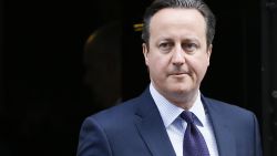 Britain's Prime Minister David Cameron leaves 10 Downing Street to attend Parliament in London, Thursday, Nov. 26, 2015. Prime Minister David Cameron says Britain must join airstrikes in Syria to deny the Islamic State group a "safe haven" from which to plot mass-casualty attacks around the world.
