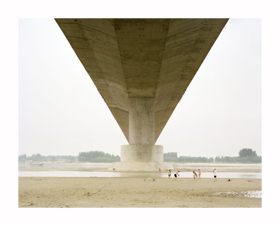 Chinese photographer Zhang Kechun spent two years photographing scenes on the bank of the Yellow River. The photos are overexposed to impart an otherworldly quality.