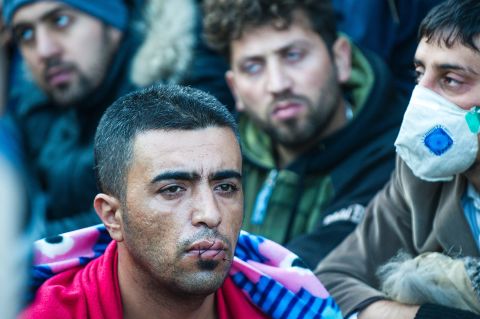 A man with his mouth sewn shut silently protests on the Greek-Macedonian border.