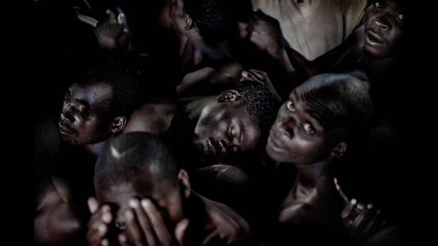 <strong>May 26:</strong> Prisoners sit in an overcrowded cell in Blantyre, Malawi. Overcrowding is a major problem in Malawian jails.