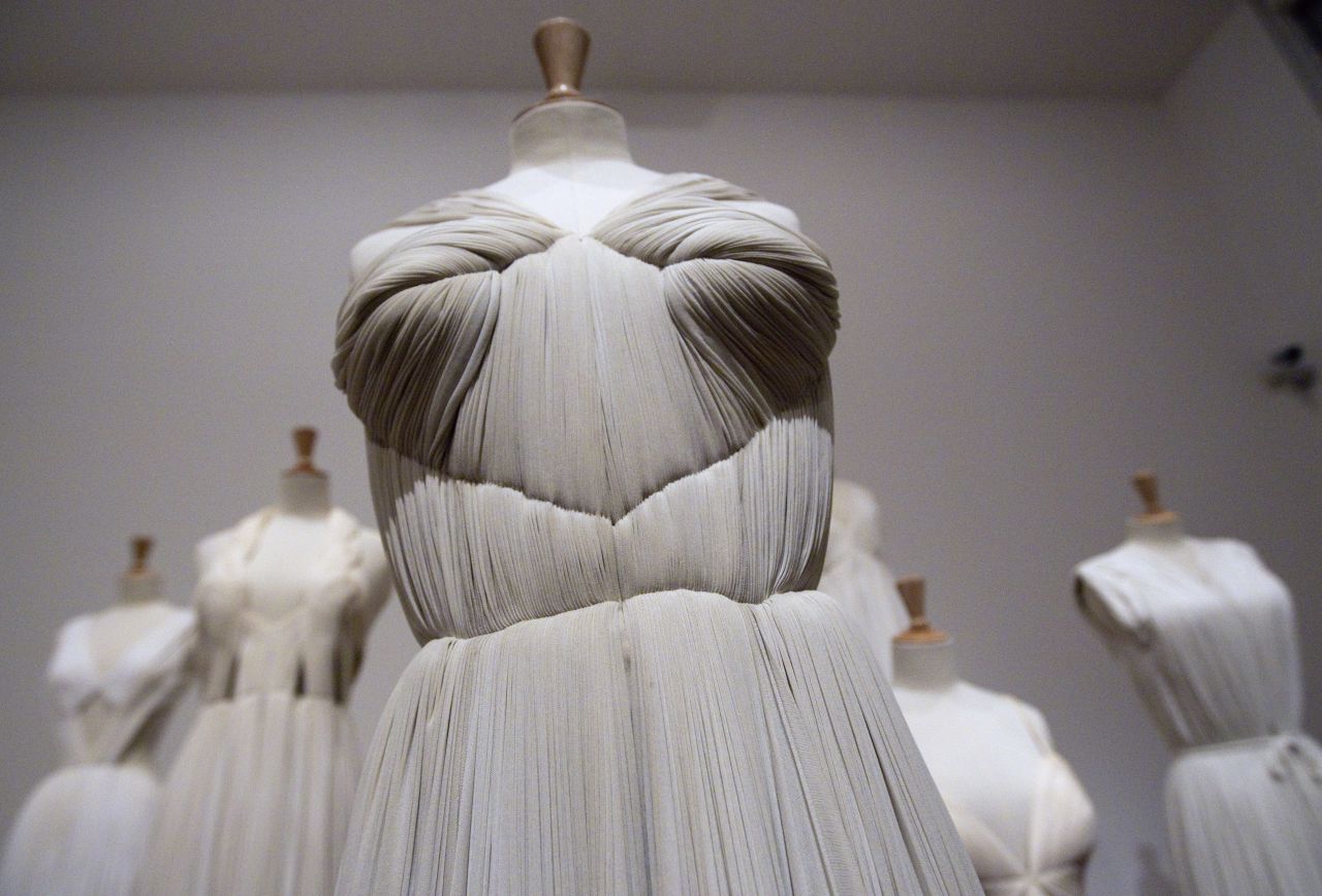 "Originally a sculptor, her silk jersey pleated dresses looked as though they had been pulled out of ancient Greece." (Pictured: A 1952 Madame Gres dress displayed at the Bourdelle Museum in Paris, 2011) 