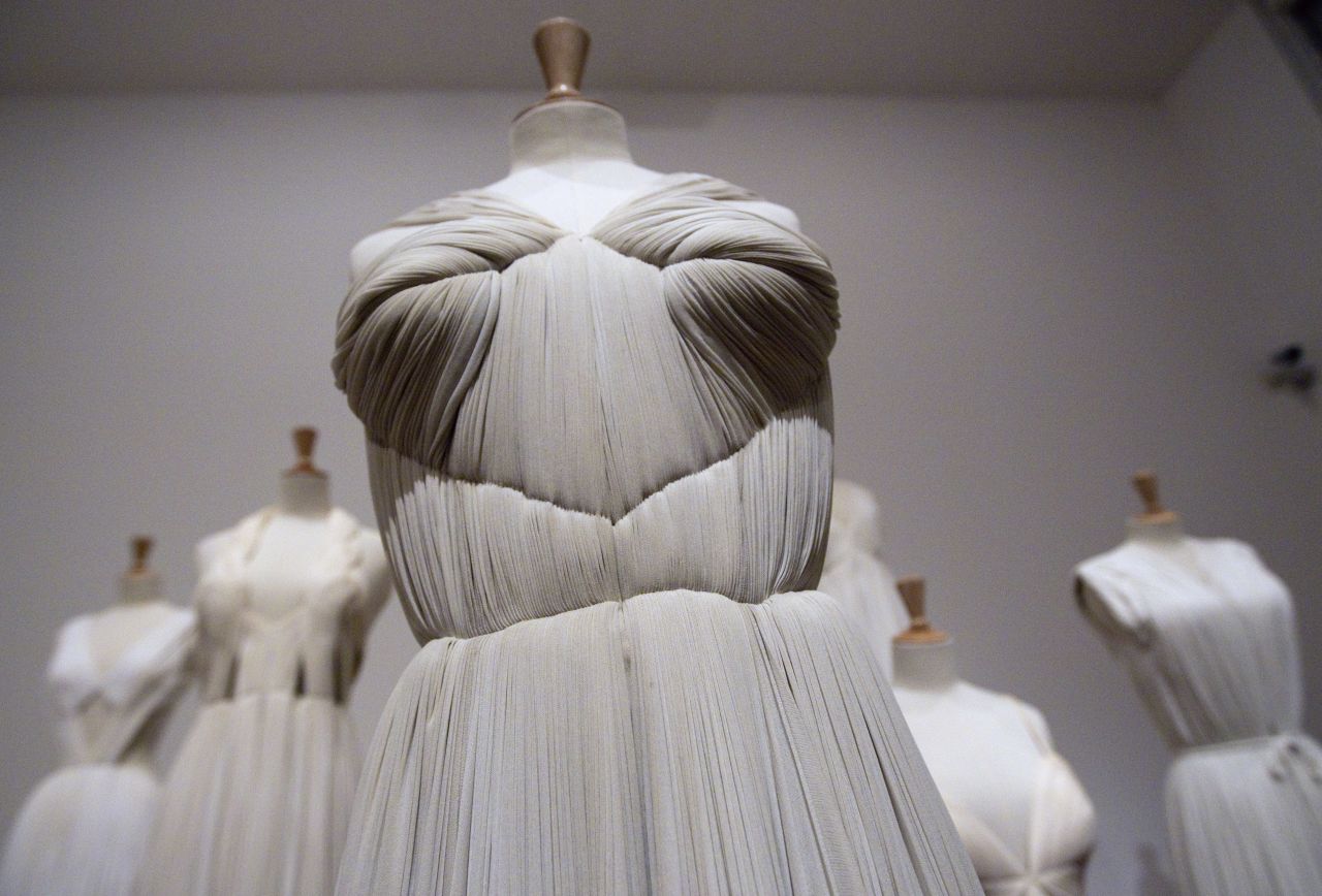 "Originally a sculptor, her silk jersey pleated dresses looked as though they had been pulled out of ancient Greece." (Pictured: A 1952 Madame Gres dress displayed at the Bourdelle Museum in Paris, 2011)