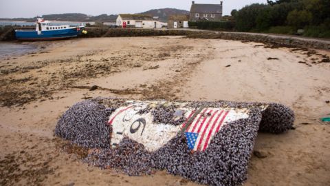 The words "Falcon 9" are visible on the debris.