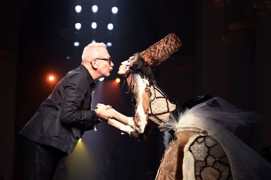 While he was a divisive figure early in his career, Gaultier is now part of the fashion establishment. (Pictured: Jean Paul Gaultier with model Anna Cleavland at his Haute Couture Autumn-Winter 2015 runway show) 