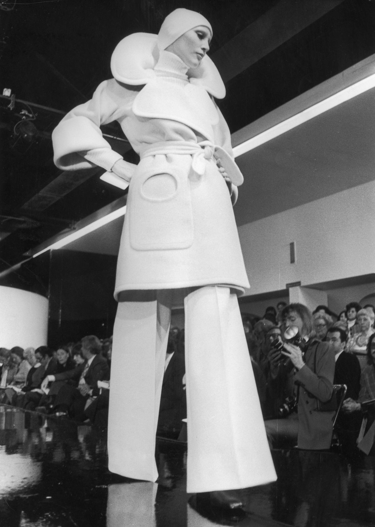 "I'd always admired Cardin because he seemed like such a showman. He was so free, doing these geometric, sometimes abstract designs that were like architecture, which he had studied before he went into fashion." (Pictured: A model walks the runway at Pierre Cardin, 1972) 